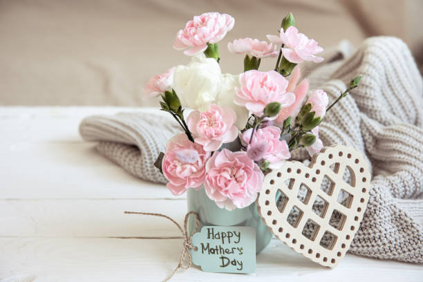 Cozy spring still life with fresh flowers for mother's day.