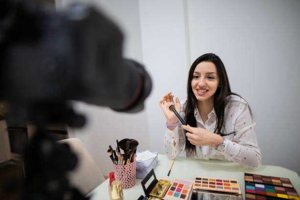 istock Girl making make up tutorial video for her blog 1309612826