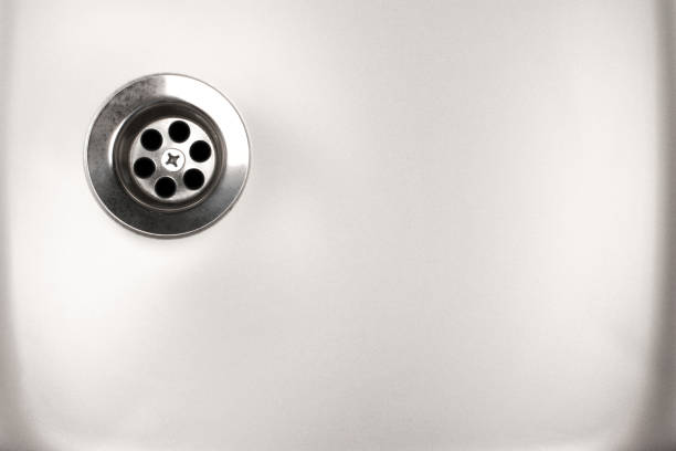 istock Close up stainless steel kitchen sink 1309614372