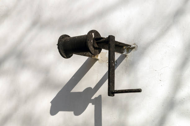 istock The old metal hand winch is black without a cable. 1309619689