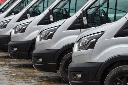 Munich, Germany - 6th October, 2020: Delivery vans Ford Transit parked on a parking. Today this model is one of the most popular LCV vehicles in Europe.