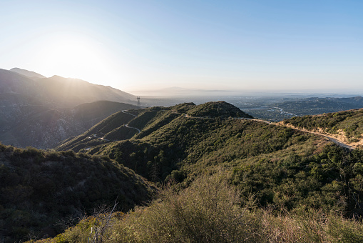 Sunrise view of Mt Lukens Truck Trail fire road and Mt Wilson  in the San Gabriel Mountains near Pasadena and Los Angeles California.