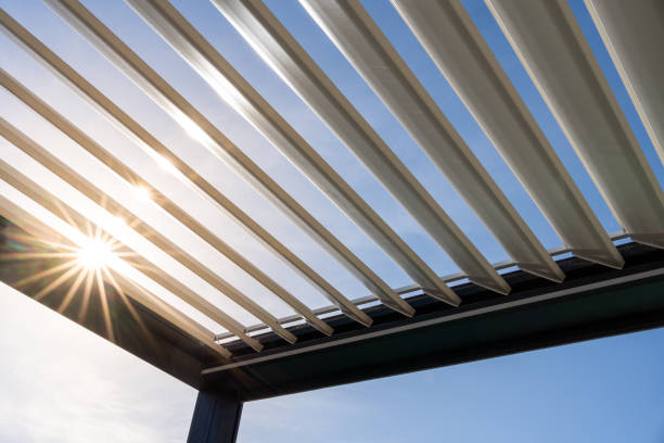 Trendy outdoor patio metallic pergola.