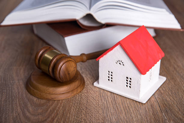 istock gavel justice hammer and house with book 1309629170