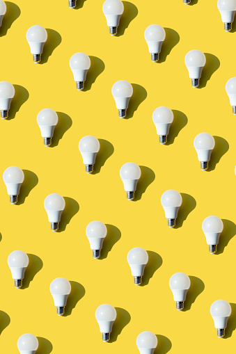 low energy light bulb  pattern on yellow background