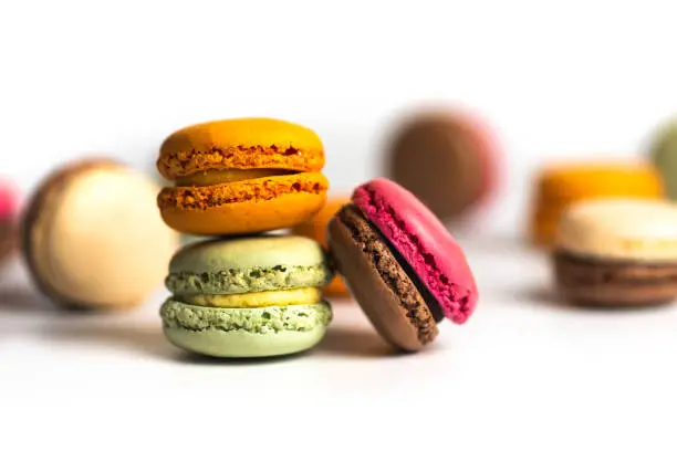 Photo of Macaroon colorful desserts on white background isolated