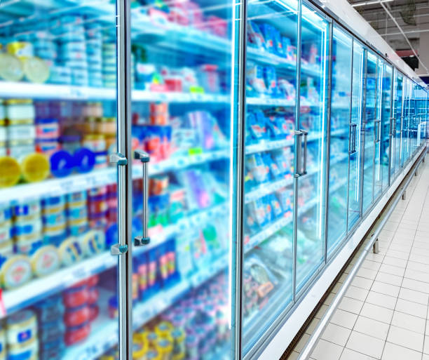 Various products in a supermarket Grocery store refrigerator with various food refrigerated section supermarket photos stock pictures, royalty-free photos & images