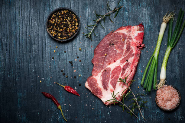 fresh pork meat on rustic wooden table - beef sirloin steak raw loin imagens e fotografias de stock