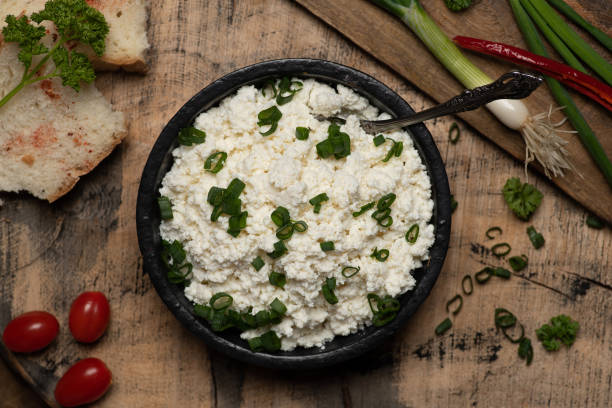 istock Crumbled young cow cheese in a bowl 1309636408