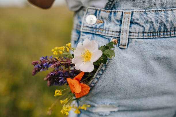istock Wildflowers in jeans pocket 1309637640