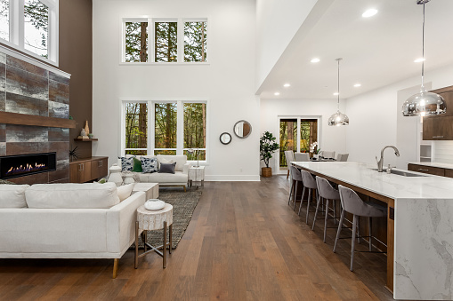 Luxury Kitchen Interior With White Cabinets, Kitchen Island And Stools