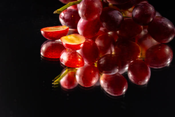 istock The grapes were cut in half on the mirror. 1309642956