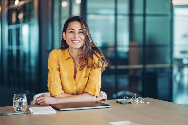 istock Confident young businesswoman in her office 1309645960