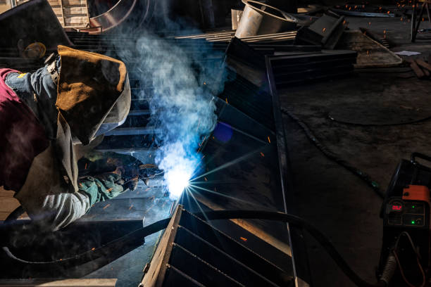 istock Gas metal arc welding. It is a welding process in which an electric arc forms between a consumable wire electrode and the workpiece metal, which heats the workpiece metal, causing them to fuse. 1309646647