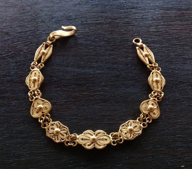 Gold bracelet built in ornamental design
