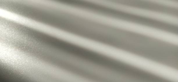 istock Gray striped background with oblique light effect. Play of light and shadow. Light rays. Gray and silver shades with white dots and shining stars. Diagonal lines from left to right 1309647590