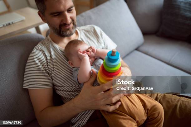 All That Play Makes Me Sleepy Stock Photo - Download Image Now - Plastic Ring, 2-5 Months, 35-39 Years