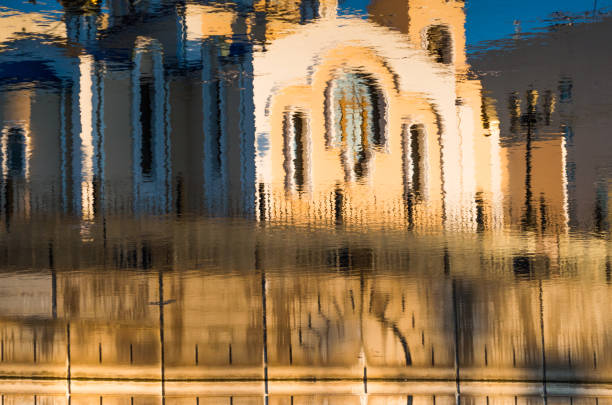 Color reflection of an architectural building in water with ripples. in Belgorod, Belgorod Oblast, Russia