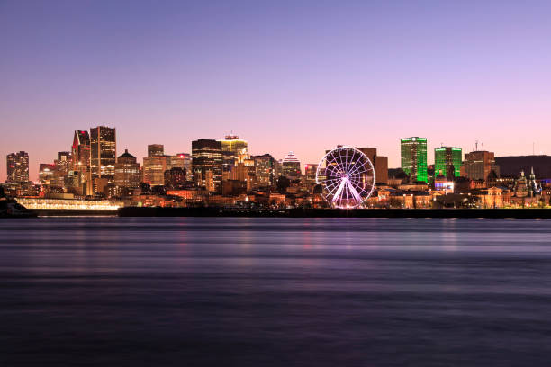 istock Montreal skyline at dusk reflected in St Lawrence River 1309652069