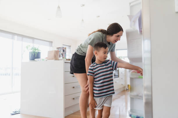 istock Son want to get something from fridge. 1309652231