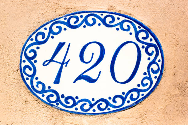 istock Blue and White Ceramic House Address Talavera Tile: 420 1309660515