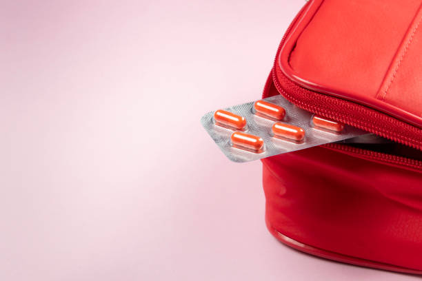 istock red medicine box with blister coming out and space for text 1309660603