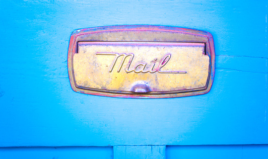 Vintage Gold-Colored Mail Slot, Blue Door