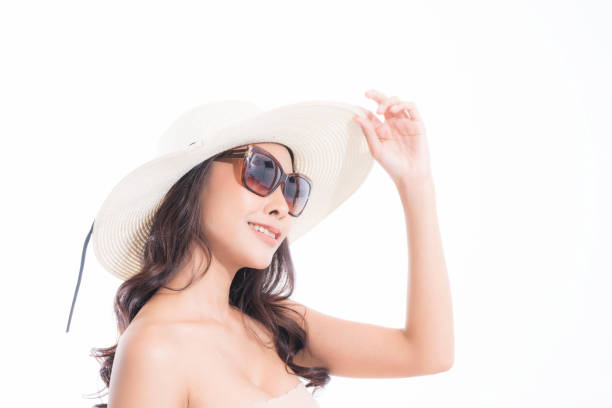 istock Woman studio portrait with sunlight. 1309662017
