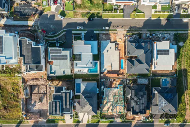 Photo of Topdown aerial view of upmarket houses under construction, Australia