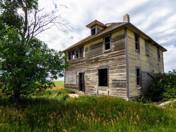 istock outside of an abandoned house 1309667407