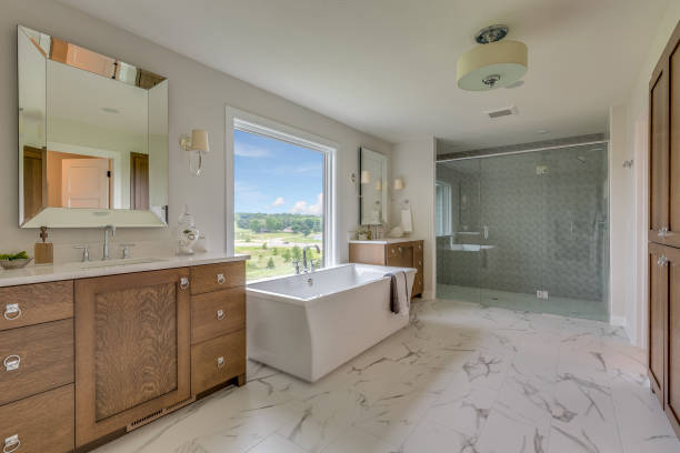 istock Spacious bathroom with large shower and free standing tub 1309668916
