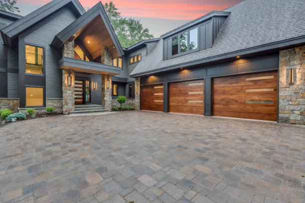 istock Wood garage door with stone columns 1309672695