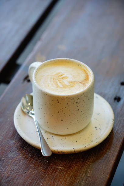 istock Coffee cup with milk or latte 1309673557