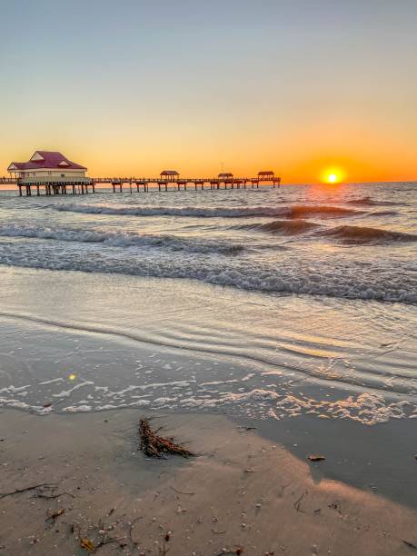 Sunset at Clearwater Beach Pier in Florida stock photo