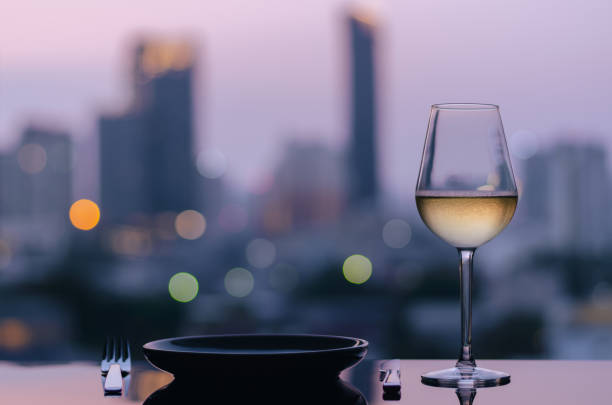 istock A glass of white wine with dish for dining put on table 1309676449