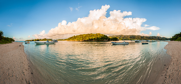 A wide panorama shot of the famous Kabira bay of Ishigaki island, Okinawa. A popular place to visit for tourists to the island and famous for its diving with Manta rays and fishing.