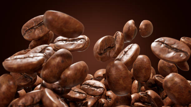 istock Many roasted coffee beans land on the ground and spin in slow motion. 3d rendering 1309681968