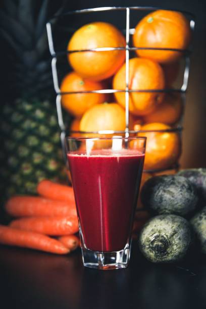 istock orange juice red in a glass 1309686284