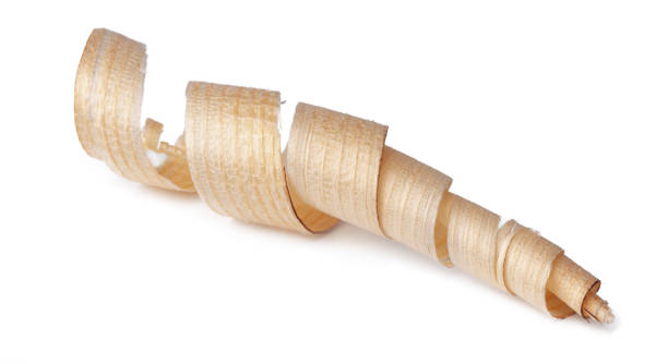 istock Wood shavings isolated on white background 1309688846