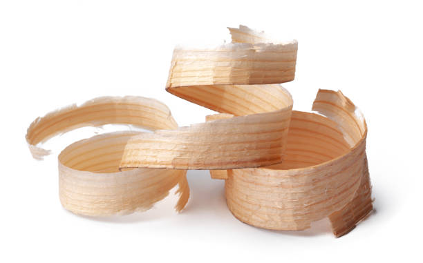 istock Wood shavings isolated on white background 1309689574