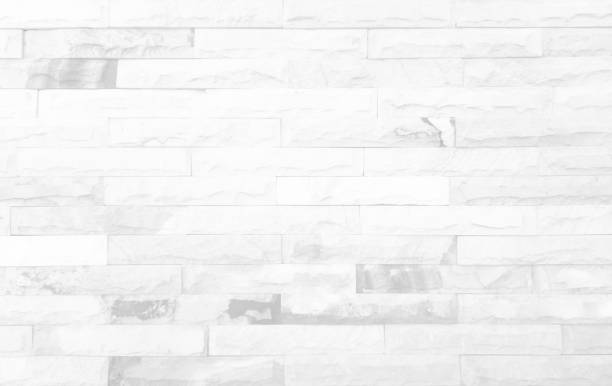 istock White grunge brick wall texture background for stone tile block painted in grey light color wallpaper modern interior and exterior and room backdrop design 1309689604
