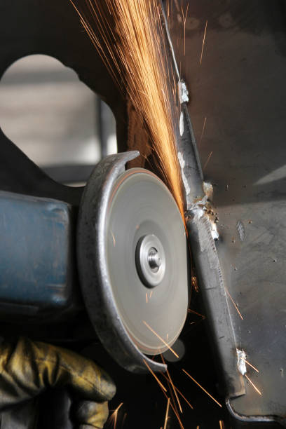 istock Steel cutter grinder and sparks in workshop. 1309692467
