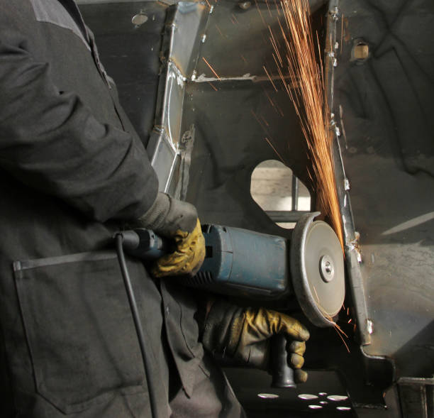 istock Steel cutter grinder and sparks in workshop. 1309692509