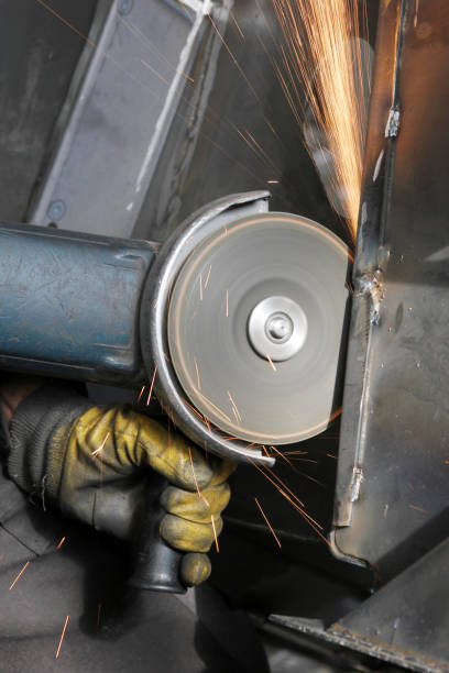 istock Steel cutter grinder and sparks in workshop. 1309692511