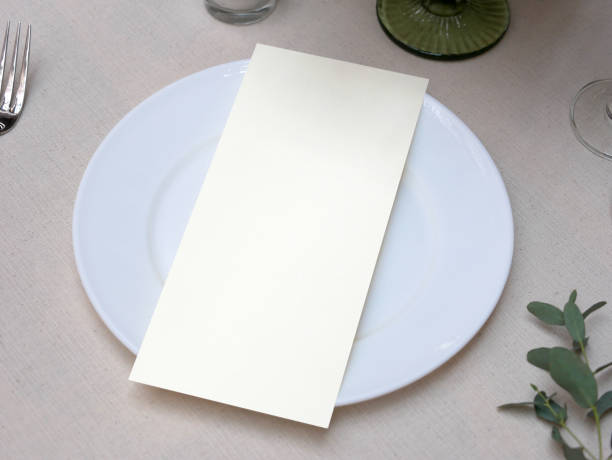 istock Mockup white blank space card, for Menu, Flyer, greeting, invitation on wedding table background. with clipping path 1309694966