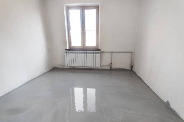 istock New self leveling floor is poured into the emty room 1309695166