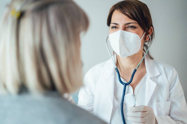istock Healthcare worker at home visit 1309697305