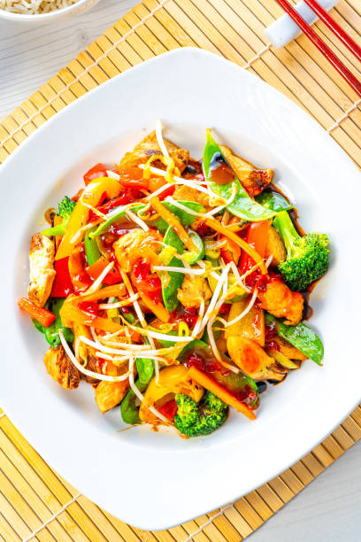 istock sweet and sour chicken with rice and vegetables 1309697566