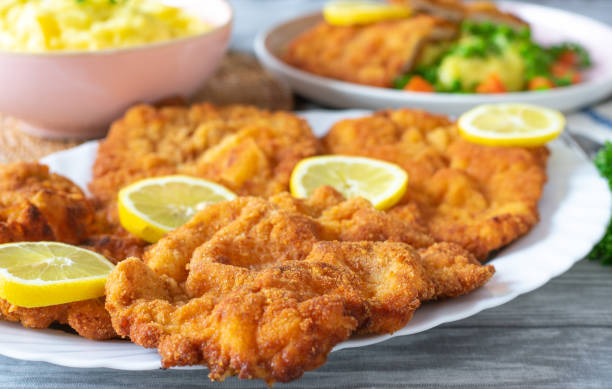 A plate of schnitzels stock photo