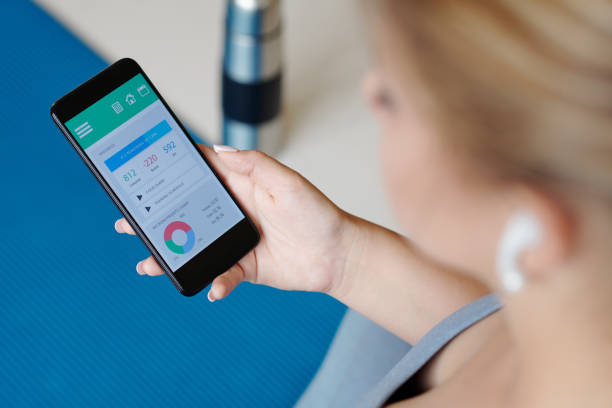 istock Woman checking burned calories 1309699824